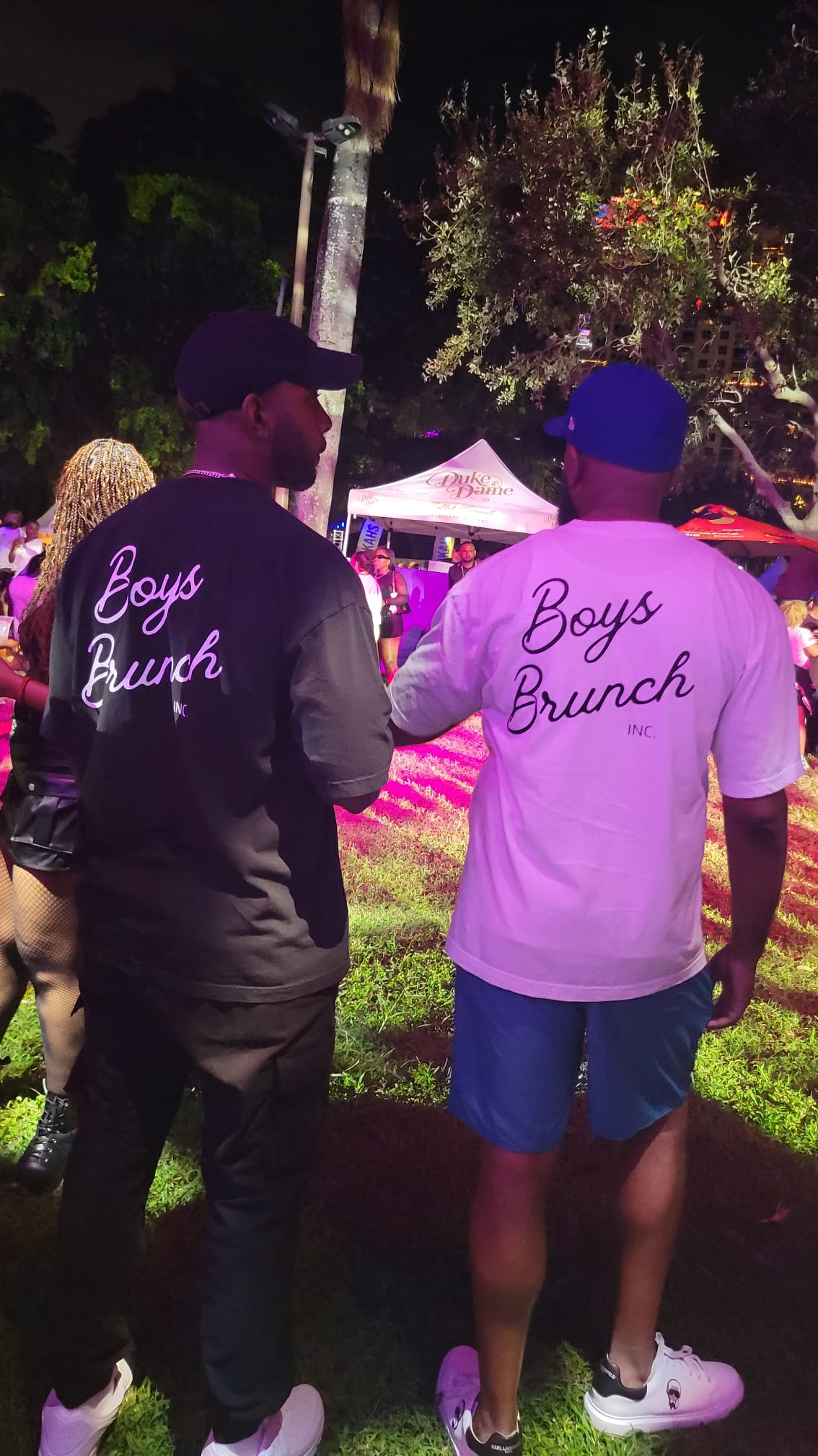 The boys in Boys Brunch merch